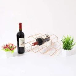 Wijnrek Hexagon 9 Flessen | Flessenrek | Wijn Accessoires | Wijnkast | Wijnrek Metaal | Wijnrekken | Wijnfleshouder | Wijnhouder | Rosé Goud 18 Wijnrek Hexagon 9 Flessen | Flessenrek | Wijn Accessoires | Wijnkast | Wijnrek Metaal | Wijnrekken | Wijnfleshouder | Wijnhouder | Rosé Goud -Skimask 1200x1200 1548