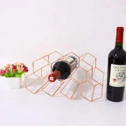 Wijnrek Hexagon 9 Flessen | Flessenrek | Wijn Accessoires | Wijnkast | Wijnrek Metaal | Wijnrekken | Wijnfleshouder | Wijnhouder | Rosé Goud 25 Wijnrek Hexagon 9 Flessen | Flessenrek | Wijn Accessoires | Wijnkast | Wijnrek Metaal | Wijnrekken | Wijnfleshouder | Wijnhouder | Rosé Goud -Skimask 1200x1200 1551