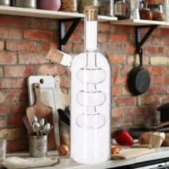 Merkloos Decopatent® 2in1 Olie En Azijnstel Glas - Bolvorm Met Kurken - Glazen Azijnfles & Oliefles In 1 - Oil And Vinegar - 9 X 9 X 21 Cm 12 Merkloos Decopatent® 2in1 Olie En Azijnstel Glas - Bolvorm Met Kurken - Glazen Azijnfles & Oliefles In 1 - Oil And Vinegar - 9 X 9 X 21 Cm -Skimask 1200x1200 4942