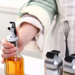 Merkloos Decopatent® Olie En Azijnstel SET Met RVS Schenktuit In Houder - Inhoud 1x Oliefles 1x Azijnfles Van Glas & 2x Specerijen Potjes 17 Merkloos Decopatent® Olie En Azijnstel SET Met RVS Schenktuit In Houder - Inhoud 1x Oliefles 1x Azijnfles Van Glas & 2x Specerijen Potjes -Skimask 1200x1200 4969